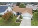 Aerial view of the property showcasing its well-maintained landscaping and attractive curb appeal at 17848 Se 87Th Bourne Ave, The Villages, FL 32162