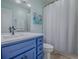 Bathroom with a vanity, sink, and a combination shower and tub at 2247 Cypress Cove Dr # E2, Tavares, FL 32778