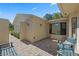 Private brick patio with comfortable seating, providing a relaxing outdoor space with ample natural light at 2247 Cypress Cove Dr # E2, Tavares, FL 32778