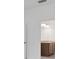 Bathroom features double sink vanity with wooden cabinets and granite countertop at 2884 Supermarine Rd, Tavares, FL 32778