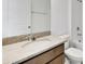 Bathroom featuring granite countertops, white sink, and a shower and bathtub combo at 2884 Supermarine Rd, Tavares, FL 32778