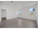 Spacious room with modern tile flooring and natural light at 2884 Supermarine Rd, Tavares, FL 32778