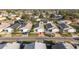 Aerial view showcasing a house's location within a residential neighborhood at 2907 Barboza Dr, The Villages, FL 32162