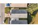 Top-down view of a house and surrounding landscape at 2907 Barboza Dr, The Villages, FL 32162