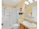 Clean bathroom with a shower/tub combo and updated vanity at 2907 Barboza Dr, The Villages, FL 32162