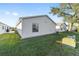 House exterior showcasing vinyl siding and a green lawn at 2907 Barboza Dr, The Villages, FL 32162