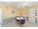 Bright kitchen features a built-in table and chairs, perfect for casual dining at 2907 Barboza Dr, The Villages, FL 32162