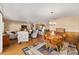 Spacious living room with comfy seating, hardwood floors, and open layout at 2907 Barboza Dr, The Villages, FL 32162