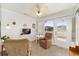 Sunroom with recliner, TV and access to backyard at 2907 Barboza Dr, The Villages, FL 32162
