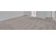 Neutral bedroom with carpet, trim, and doorway at 2992 Supermarine Rd, Tavares, FL 32778