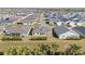 Aerial view of the community highlighting the home's location in the neighborhood at 320 Zingale Ln, The Villages, FL 32163