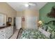 Cozy bedroom with a ceiling fan and built-in closet at 3248 Killington Loop, The Villages, FL 32163