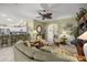 Spacious living room, featuring a comfortable seating area and open floor plan at 3248 Killington Loop, The Villages, FL 32163