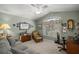 Home office with a comfortable sitting area and built-in desk at 3248 Killington Loop, The Villages, FL 32163