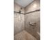 Large walk-in shower with tiled walls and built-in seat at 3248 Killington Loop, The Villages, FL 32163
