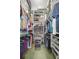 Large walk-in closet with ample shelving and hanging space at 3248 Killington Loop, The Villages, FL 32163