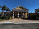 Community building with columns and landscaping at 3615 Conroy Rd # 614, Orlando, FL 32839