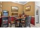 Small dining area with table and chairs at 3615 Conroy Rd # 614, Orlando, FL 32839