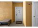 Condo entry with white door and small mat at 3615 Conroy Rd # 614, Orlando, FL 32839