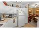 Kitchen with refrigerator and ample counter space at 3615 Conroy Rd # 614, Orlando, FL 32839