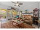Relaxing living room with leather couches and large windows at 3615 Conroy Rd # 614, Orlando, FL 32839