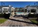 Inviting pool area with white pergola and landscaping at 3615 Conroy Rd # 614, Orlando, FL 32839