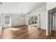 Bright dining room with wood floors and sliding glass doors at 3806 Doune Way, Clermont, FL 34711