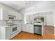 Modern kitchen with stainless steel appliances and ample counter space at 3806 Doune Way, Clermont, FL 34711