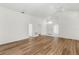 Spacious living room featuring wood-look floors and high ceilings at 3806 Doune Way, Clermont, FL 34711