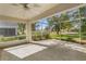Spacious screened porch overlooking a green backyard at 3806 Doune Way, Clermont, FL 34711