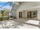 Enclosed porch with sliding glass doors leading to the house at 3806 Doune Way, Clermont, FL 34711