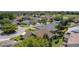 Wide aerial view of the house and neighborhood at 546 Foxfield Path, The Villages, FL 32162