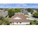 Aerial view showcasing home's backyard and neighborhood at 546 Foxfield Path, The Villages, FL 32162