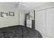 Bedroom featuring a ceiling fan and generous closet space at 546 Foxfield Path, The Villages, FL 32162