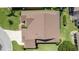 Top-down view of the house roof and yard at 546 Foxfield Path, The Villages, FL 32162