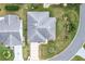 Aerial view of a home's roof and surrounding landscape at 603 San Pedro Dr, Lady Lake, FL 32159