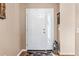 Bright entryway with hardwood floors and a lantern at 603 San Pedro Dr, Lady Lake, FL 32159