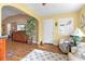 Bright living room with hardwood floors, comfortable seating, and stylish decor at 603 San Pedro Dr, Lady Lake, FL 32159