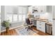 Bright home office features a built-in desk, shelves, and a shuttered window at 603 San Pedro Dr, Lady Lake, FL 32159