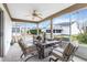 Relaxing screened porch, perfect for outdoor dining at 603 San Pedro Dr, Lady Lake, FL 32159