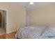 Spacious bedroom with king-size bed and en-suite bathroom at 11038 Se 170Th Lane Rd, Summerfield, FL 34491