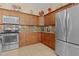 Kitchen boasts granite countertops and stainless steel appliances at 11038 Se 170Th Lane Rd, Summerfield, FL 34491