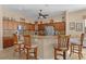 Spacious kitchen with granite countertops and stainless steel appliances at 11038 Se 170Th Lane Rd, Summerfield, FL 34491