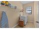 Laundry room with washer, dryer, and ample storage at 11038 Se 170Th Lane Rd, Summerfield, FL 34491