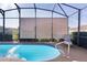 Relaxing screened-in pool with adjustable shades at 11038 Se 170Th Lane Rd, Summerfield, FL 34491