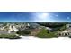 Panoramic aerial view of community, lake, and clubhouse at 1559 Nassau Cir, Tavares, FL 32778