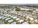 Aerial view of mobile home community near water at 1559 Nassau Cir, Tavares, FL 32778