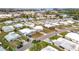 Aerial view of mobile home community near water at 1559 Nassau Cir, Tavares, FL 32778