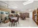 Community room with bookshelves, tables, and comfortable seating at 1559 Nassau Cir, Tavares, FL 32778