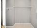 Walk-in closet with wire shelving and hanging rod at 17113 Se 78Th Larchmont Ct, The Villages, FL 32162